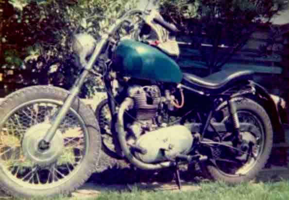 A basket case Royal Enfield Interceptor with a set of Triumph forks