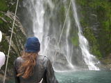 Ann in front of one of very many water falls in this system of Fiords